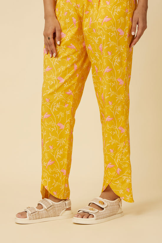 Front view of the Peela Sunshine Pants with a trendy tulip hemline and practical side pockets, radiating a cheerful and stylish vibe