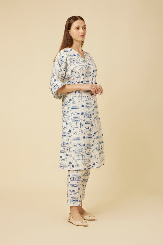Side view of the elegant Homeland Kurta in a loose fit with a unique sleeve design, coordinated with straight-cut pants, reflecting Kerala's cultural heritage