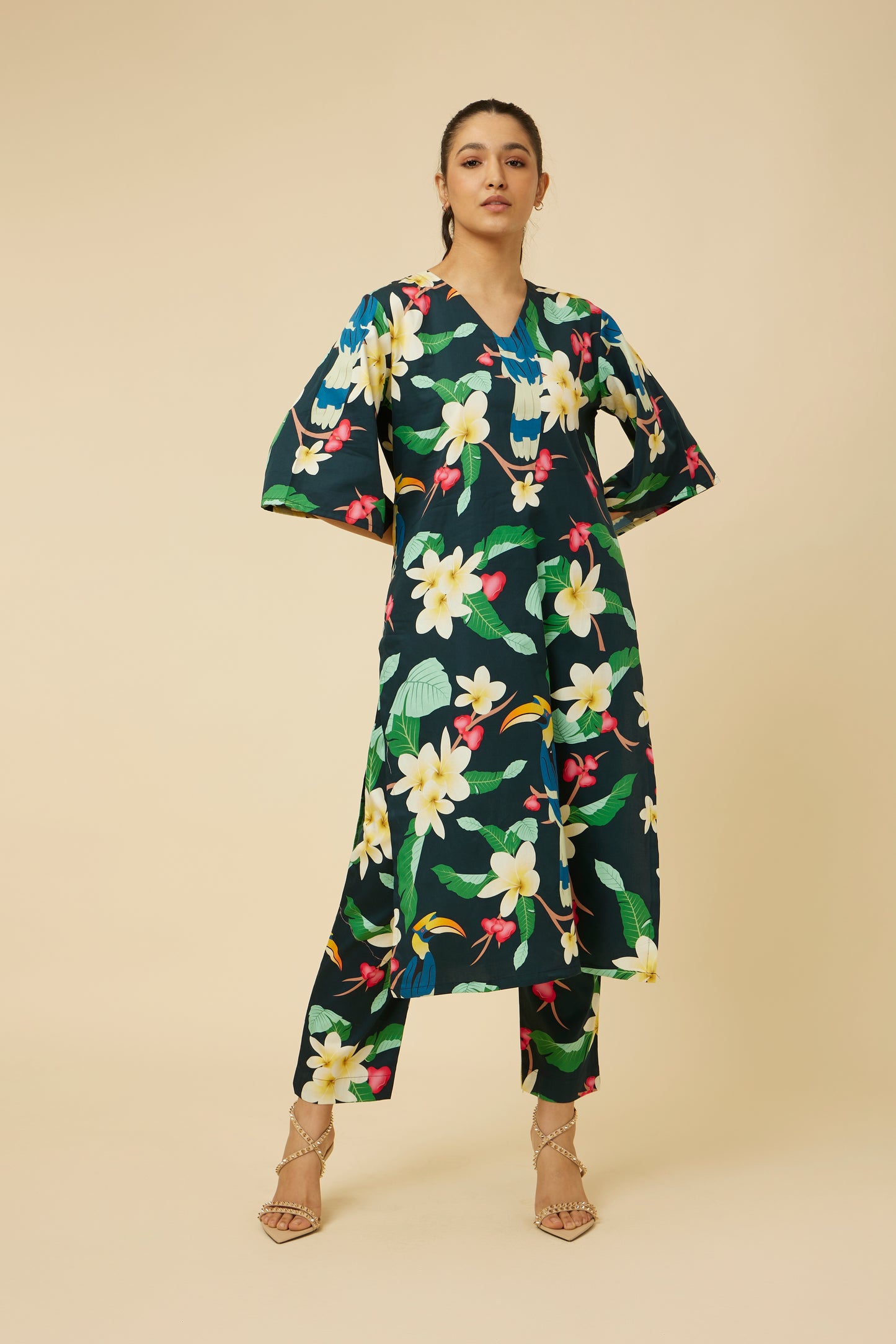 Front angle view of Hypsway's Kaala Summery Kurta & Pants in dark floral print, highlighting the unique V-neck and kimono sleeve design on a mode